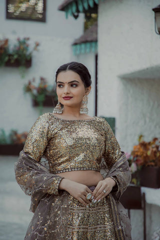Gold Shimmering Faux Georgette Sequins Lehenga Set with Can-Can ClothsVilla