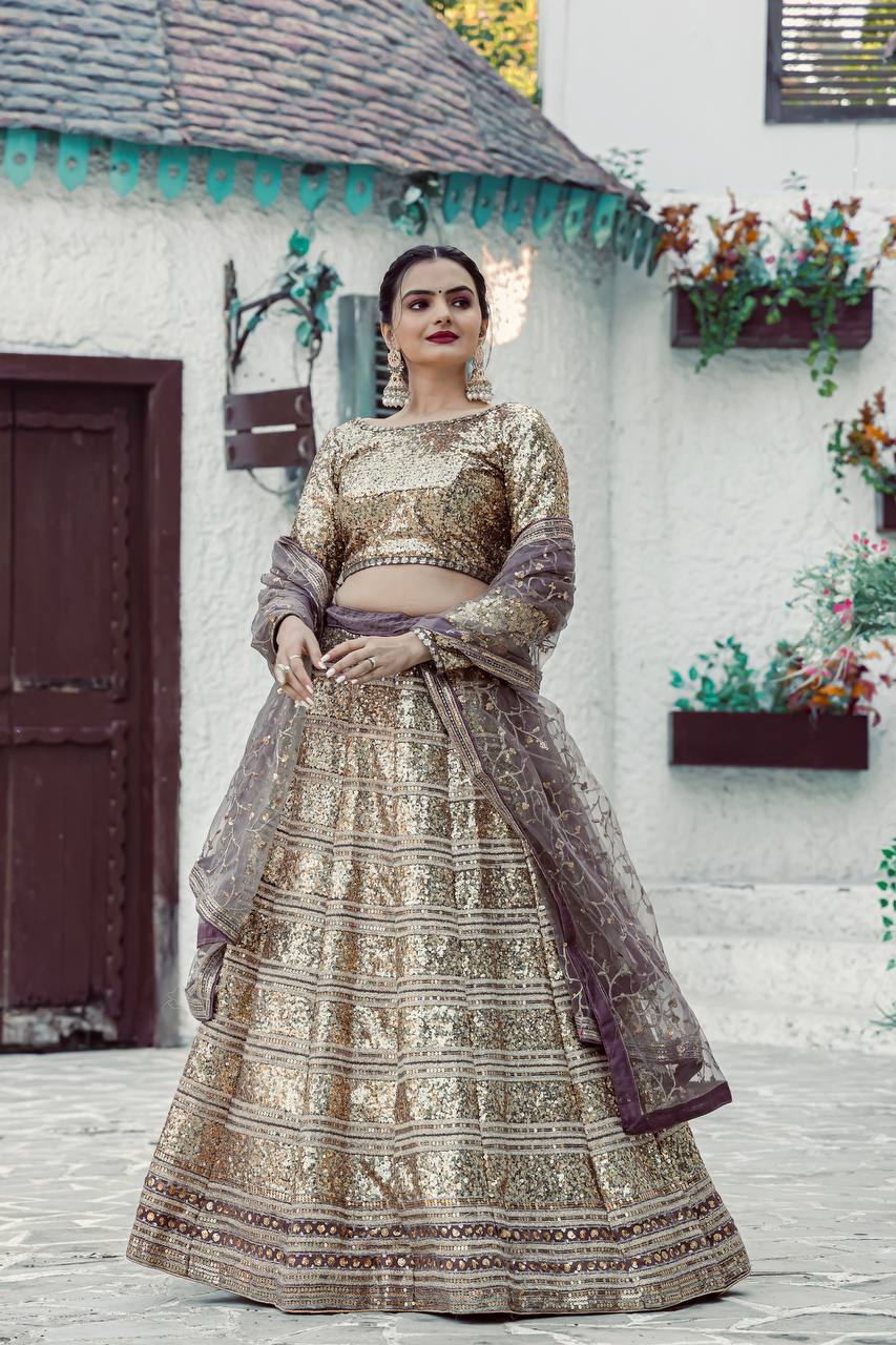 Gold Shimmering Faux Georgette Sequins Lehenga Set with Can-Can ClothsVilla Main image