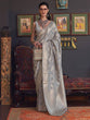 Load image into Gallery viewer, Gray Banarasi Silk Blend Saree with Bidri Work &amp; Zari Buta – Gold Accents &amp; Tassel Detailing ClothsVilla