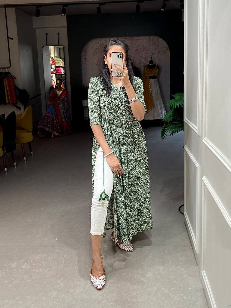 Green Color Classy & Comfy Rayon Cotton Nayra Kurti with Foil Print and Tassels ClothsVilla