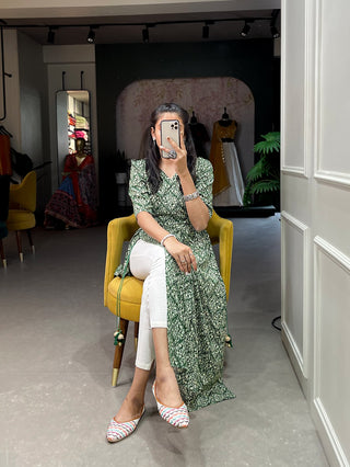 Green Color Classy & Comfy Rayon Cotton Nayra Kurti with Foil Print and Tassels ClothsVilla