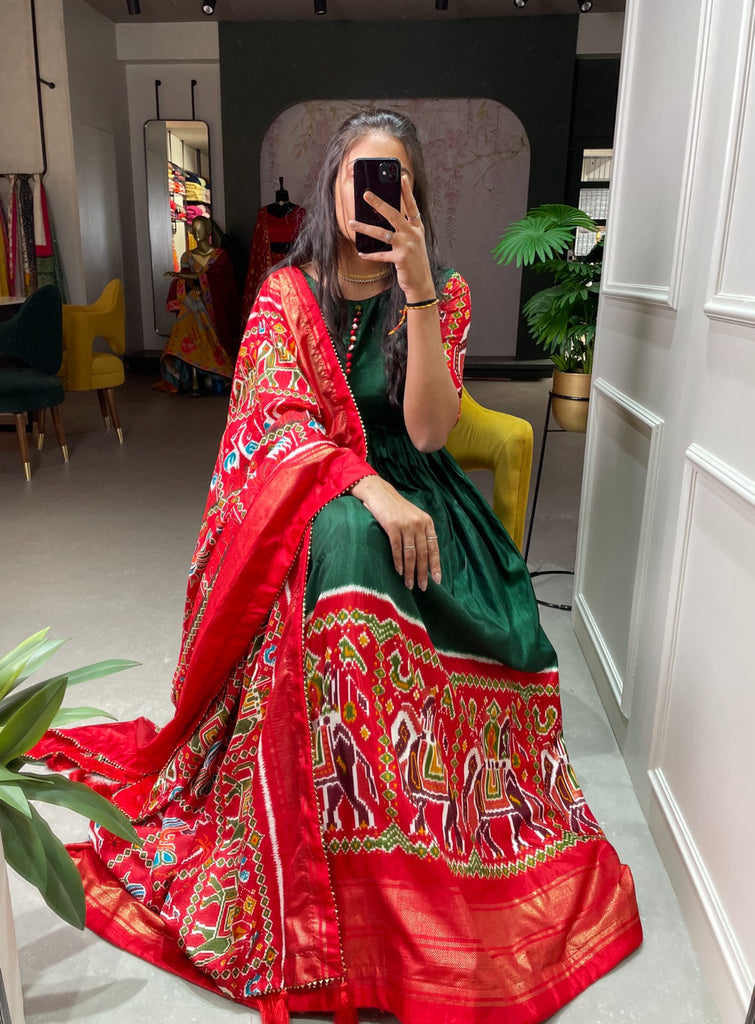 Green Color Patola And Foil Printed Dola Silk Gown Clothsvilla