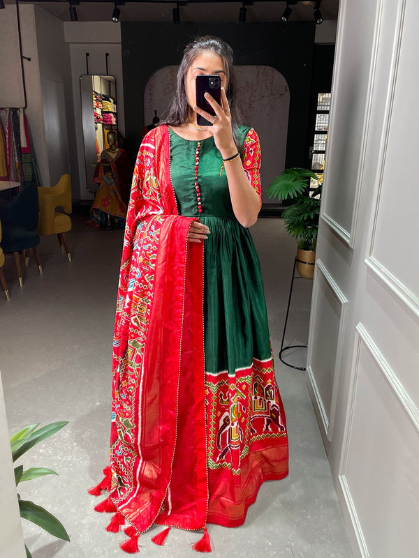 Green Color Patola And Foil Printed Dola Silk Gown Clothsvilla