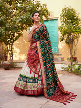 Load image into Gallery viewer, Green Color Patola Print Tussar Silk Lehenga Choli with Foil Detailing ClothsVilla
