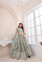 Load image into Gallery viewer, Designer Green Lehenga Choli with Multicolor Thread Embroidery ClothsVilla