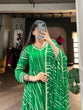 Load image into Gallery viewer, Green Leheriya Georgette Gown with Dupatta – Festive Elegance with Lace Touch-Up