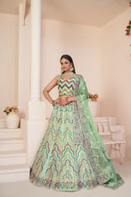 Load image into Gallery viewer, Mesmerizing Green Party Wear Lehenga Choli Set ClothsVilla