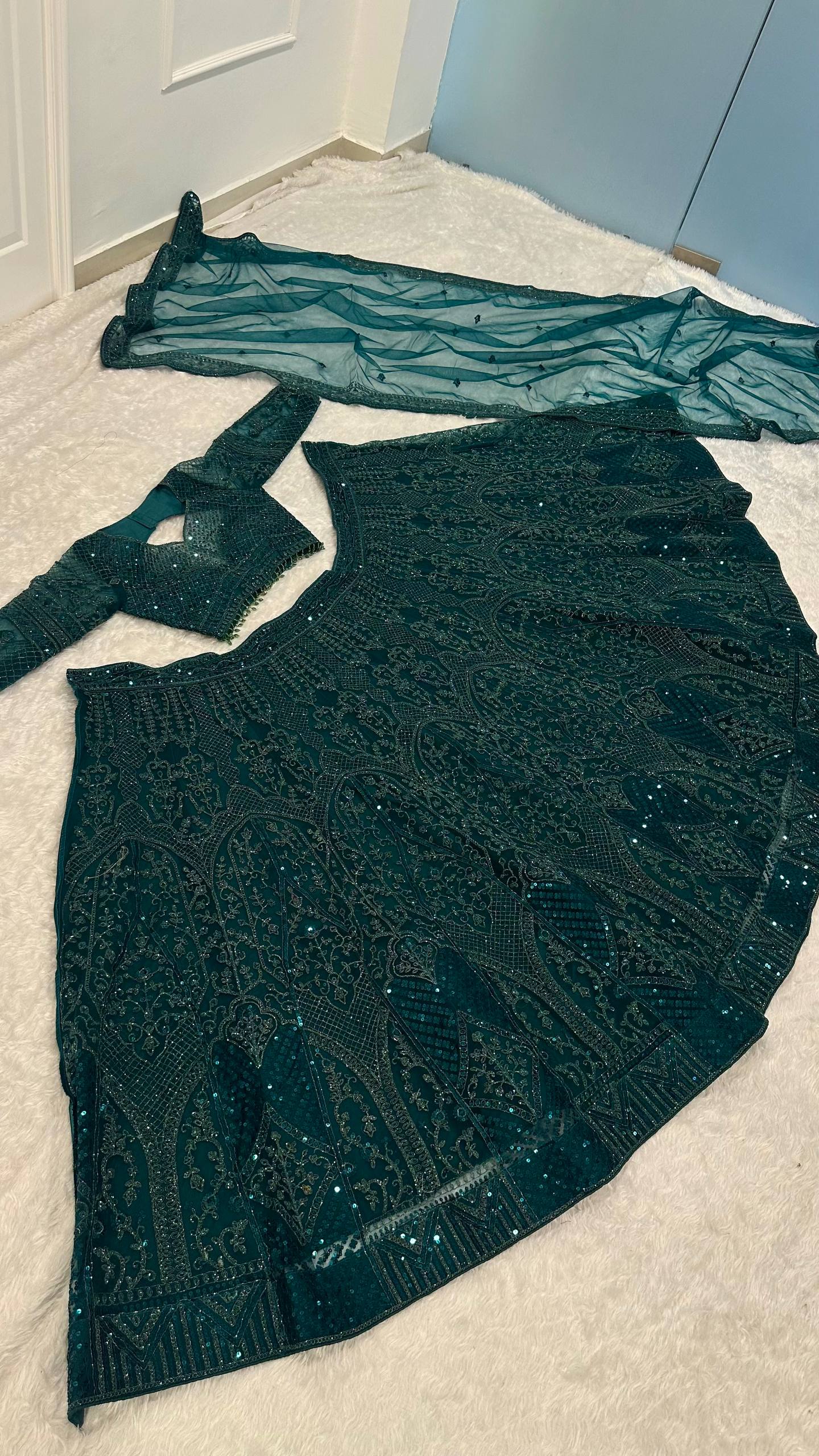 Green Premium Net Designer Lehenga ClothsVilla