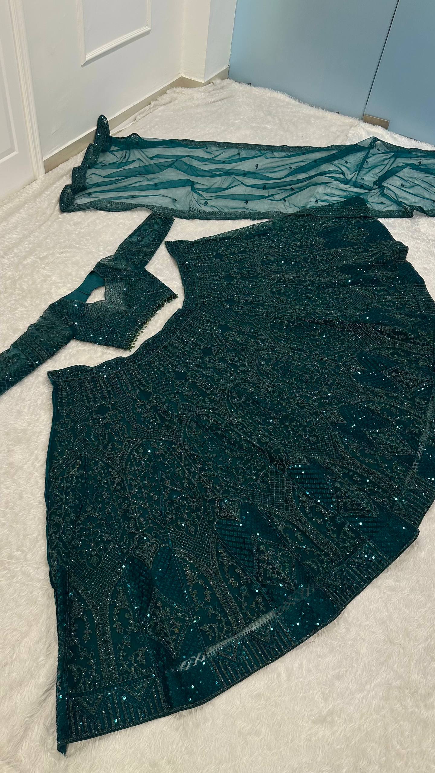 Green Premium Net Designer Lehenga ClothsVilla
