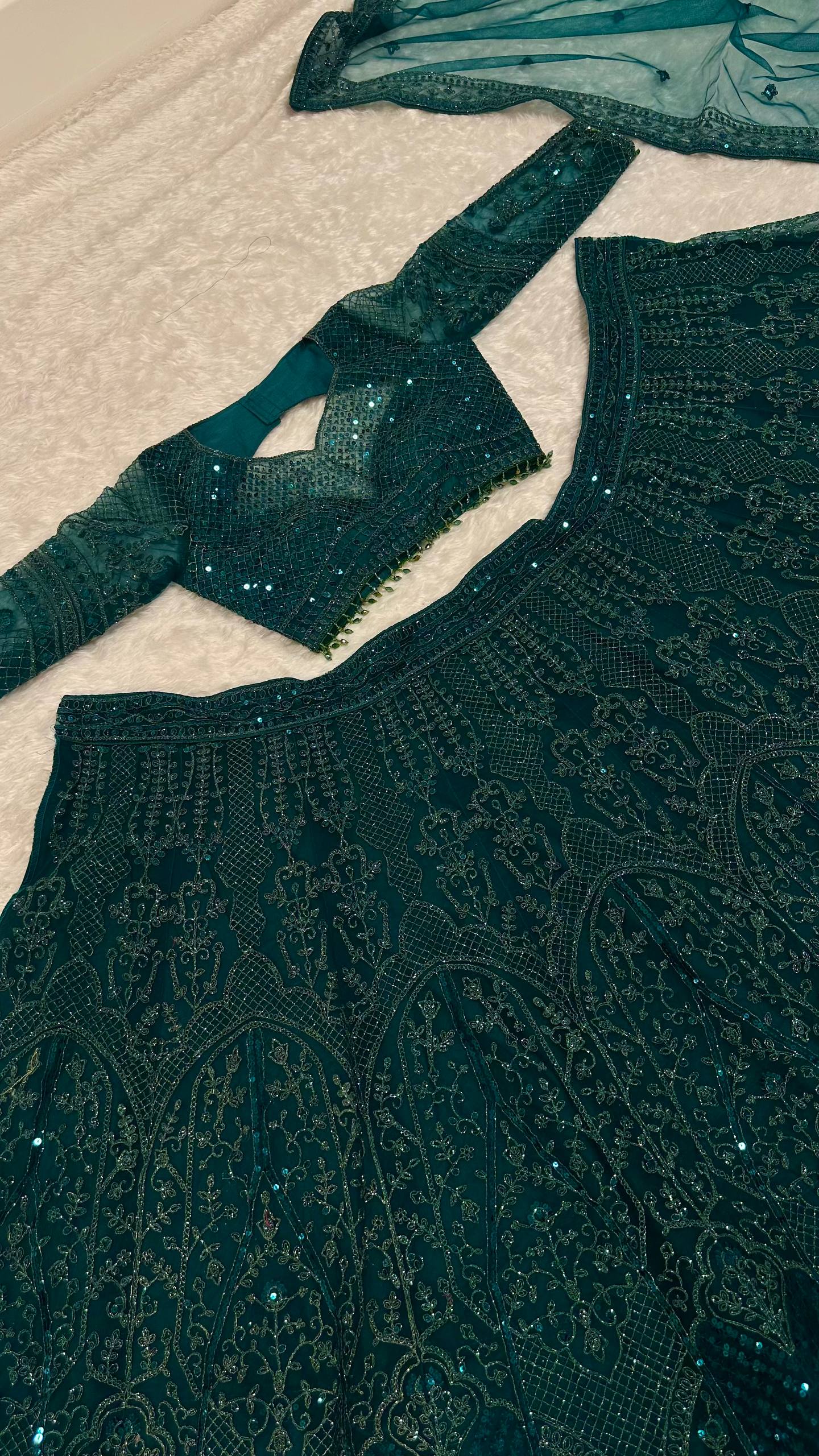 Green Premium Net Designer Lehenga ClothsVilla