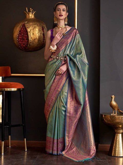 Jade Green Elegant Banarasi Silk Blend Woven Saree with Tassel Detailing ClothsVilla Main image