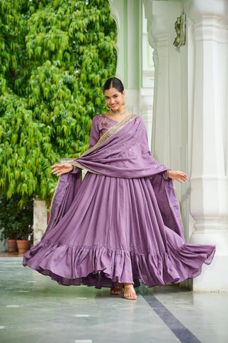 Lavender Elegant Vichitra Silk Gown with Rich Zari & Thread Embroidery and Dupatta – Designer Full-Sleeve Frill Gown ClothsVilla