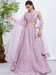 Load image into Gallery viewer, Lavender Net Lehenga Choli &amp; Dupatta with Cutdana, Sequins &amp; Zarkan Embroidery ClothsVilla