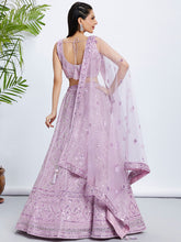 Load image into Gallery viewer, Lavender Net Lehenga Choli &amp; Dupatta with Cutdana, Sequins &amp; Zarkan Embroidery ClothsVilla