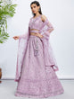 Load image into Gallery viewer, Lavender Net Lehenga Choli &amp; Dupatta with Cutdana, Sequins &amp; Zarkan Embroidery ClothsVilla