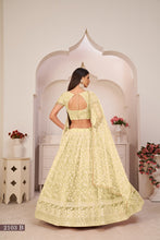 Load image into Gallery viewer, Lemon Yellow Elegant Butterfly Net Lehenga with Intricate Embroidery ClothsVilla