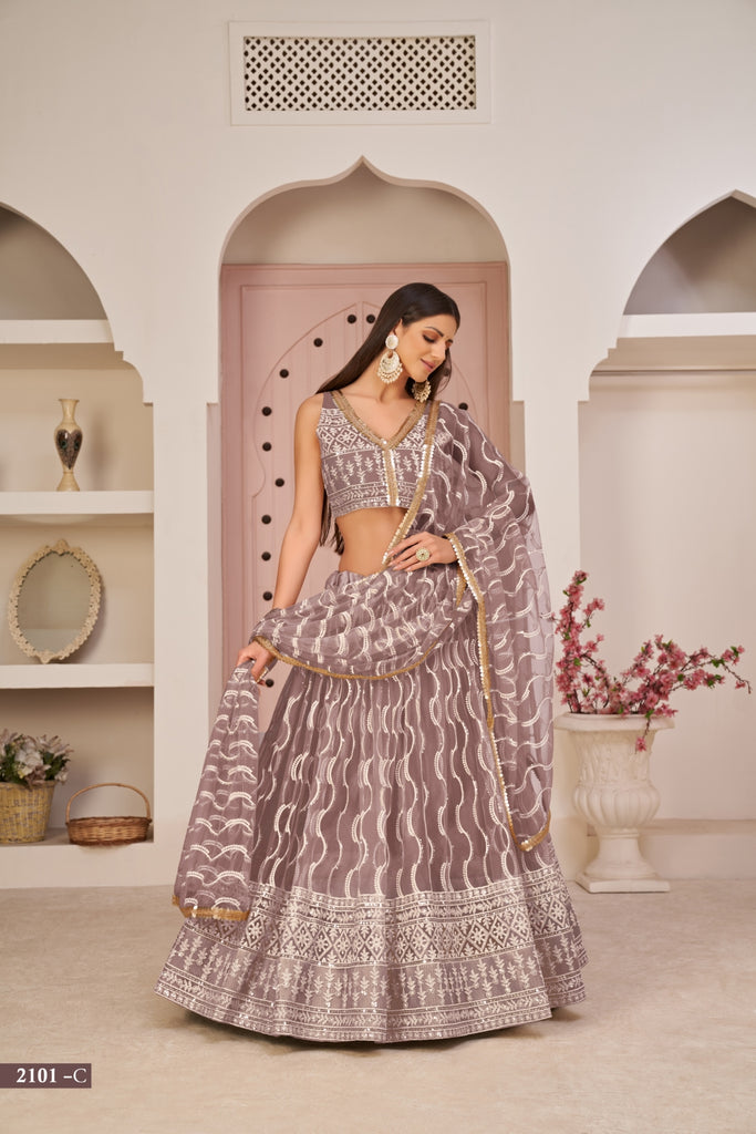 Light Brown Butterfly Net Lehenga with White Cotton Thread, Zari, and Sandwich Sequence Embroidery ClothsVilla