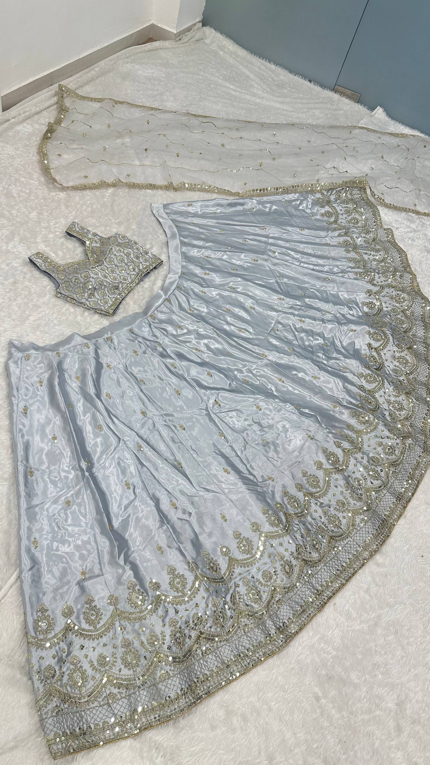 Light Gray Satin Silk Sequins Embroidered Lehenga Choli Set with 3.5-Meter Flair & Net Dupatta ClothsVilla