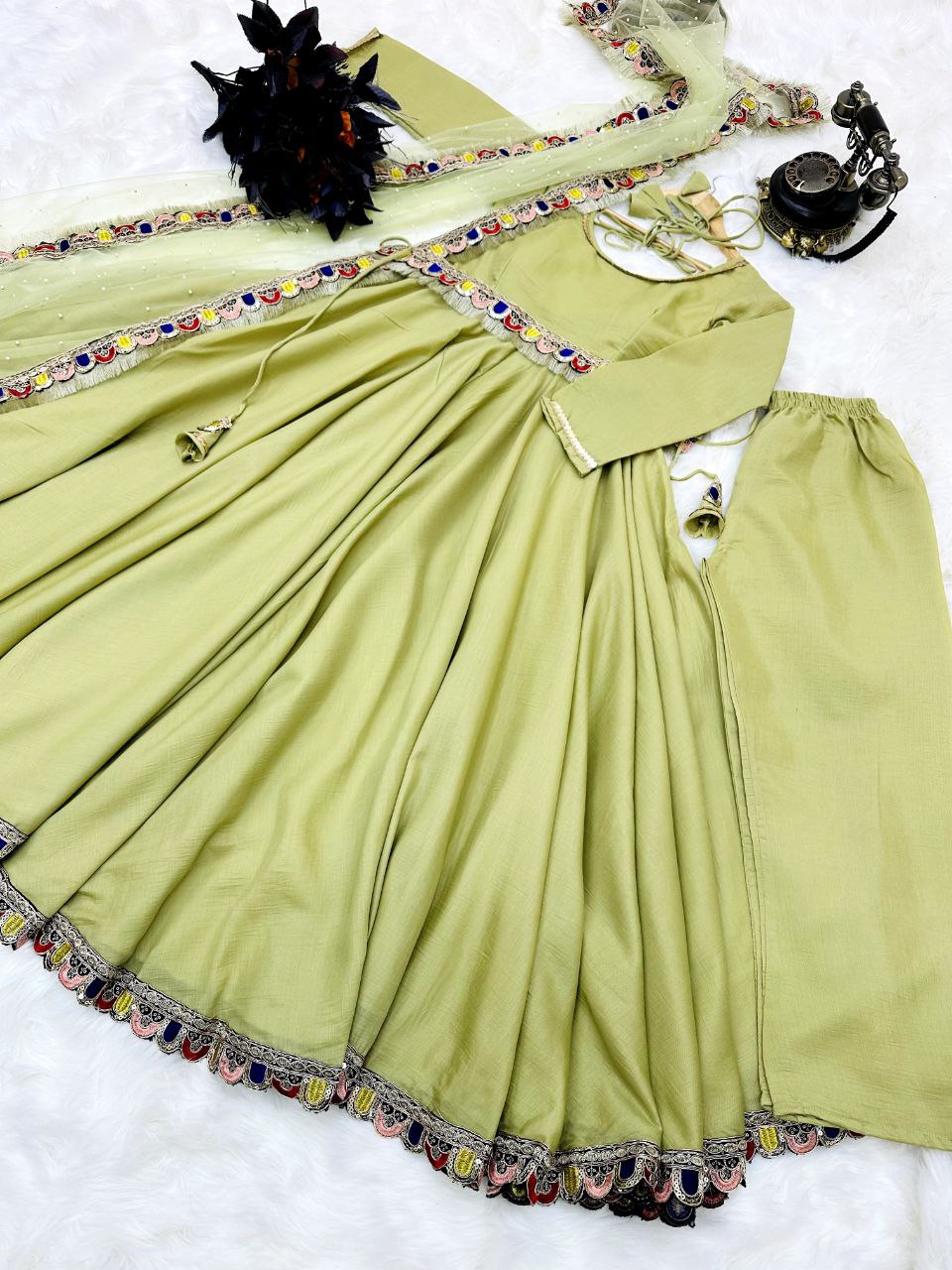 Light Green Luxurious Chinon Silk Embroidered Gown with Flowing 8 Meter Flair ClothsVilla
