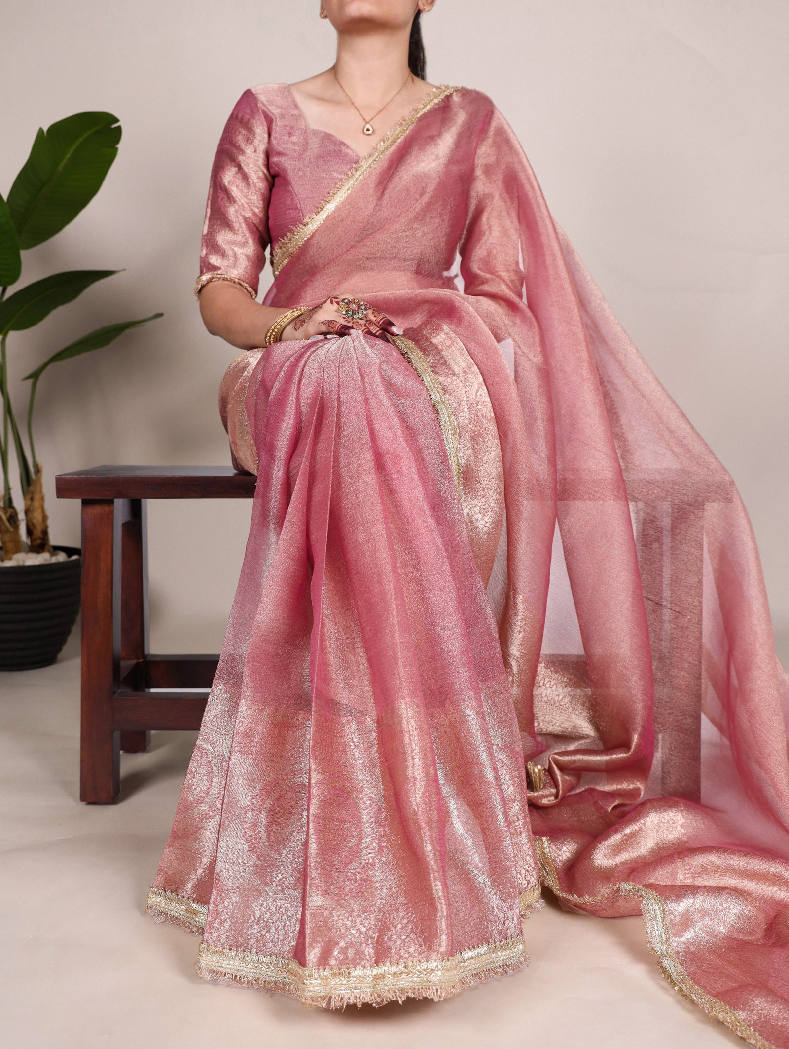 Light Pink Elegant Tissue Shimmer Saree with Zari Weaving and Sequins Lace Border