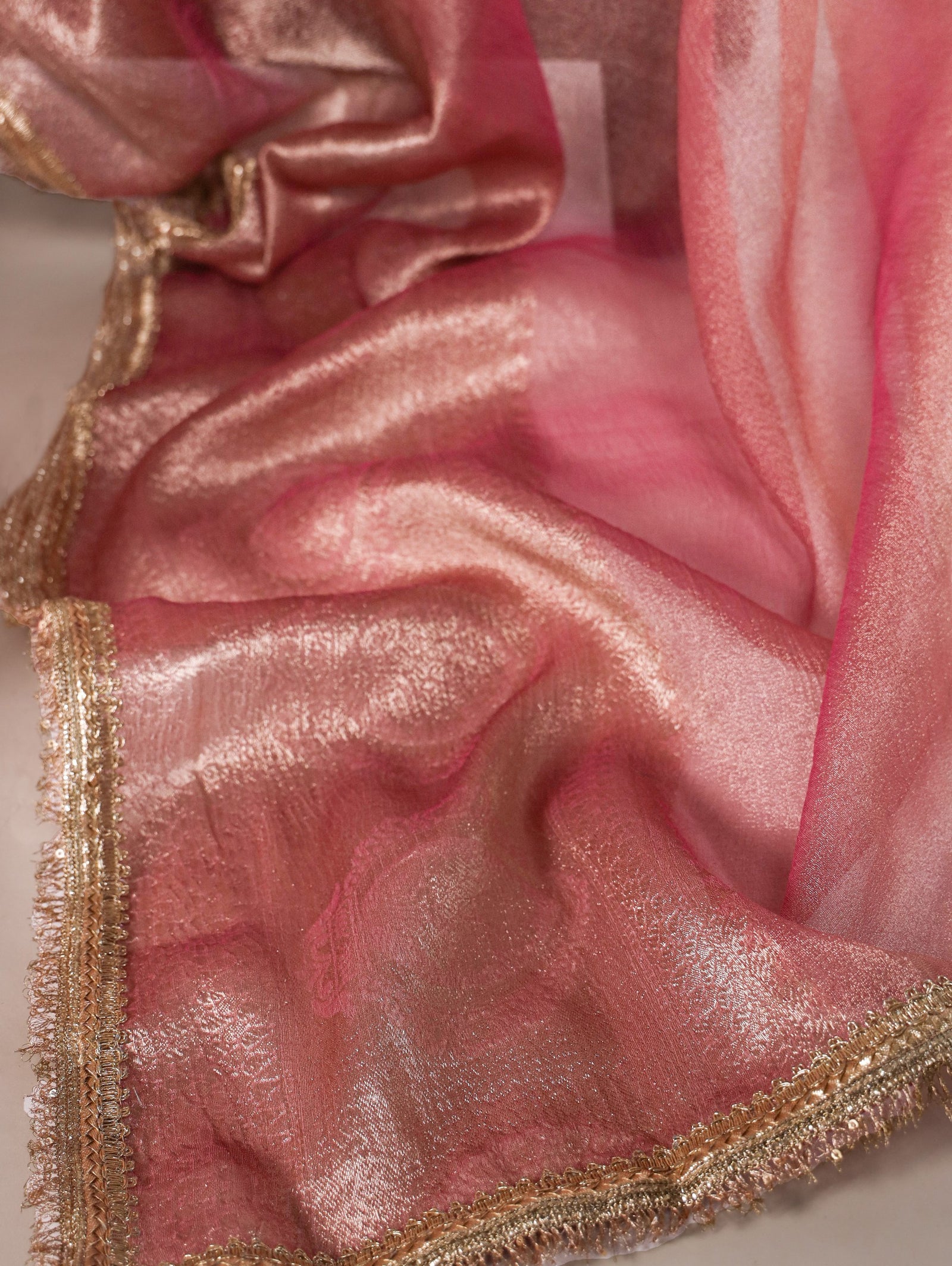 Light Pink Elegant Tissue Shimmer Saree with Zari Weaving and Sequins Lace Border