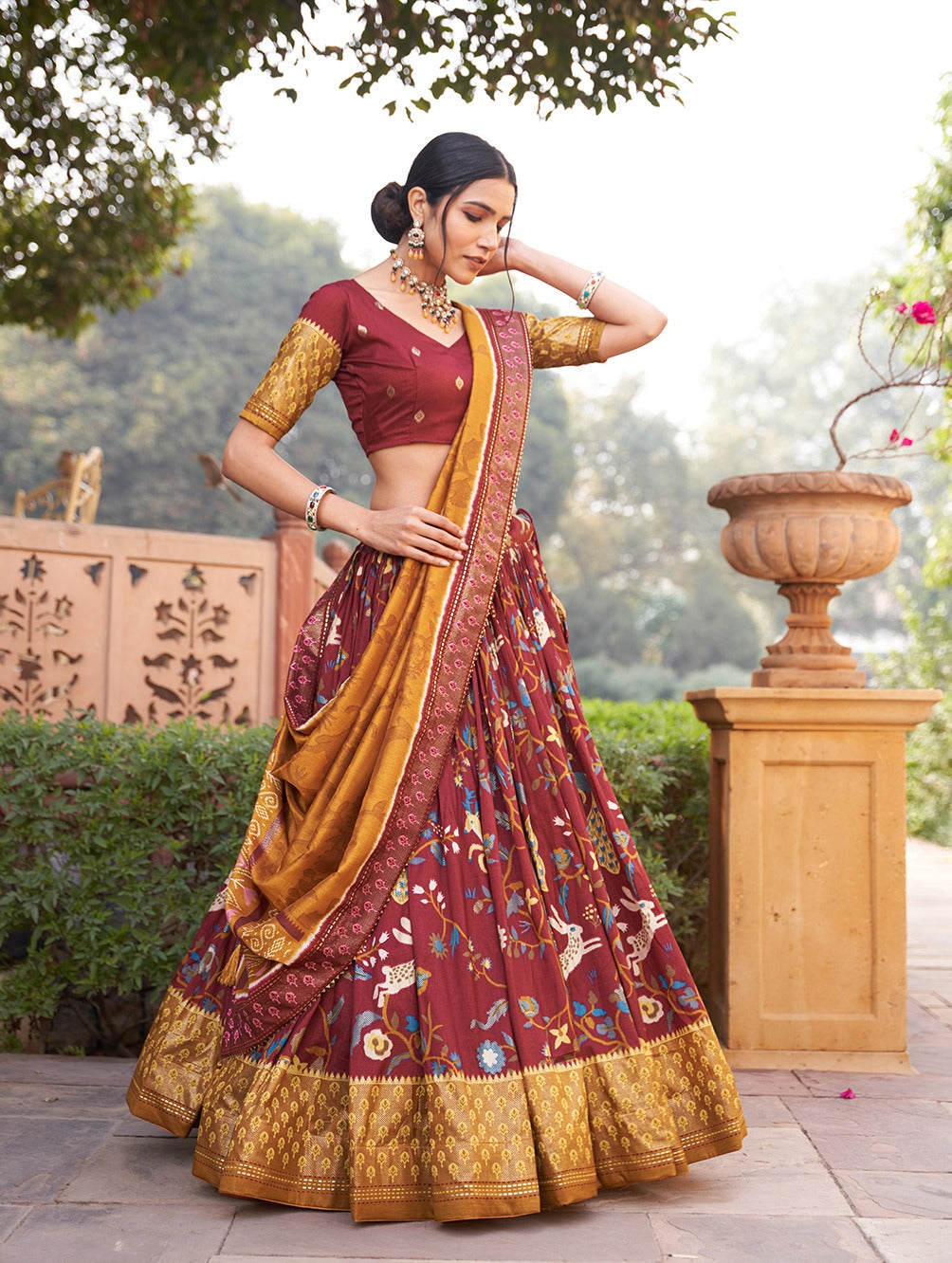 Maroon Color Mesmerize in Dola Silk Elegance Printed Lehenga Choli Set with Foil Work & Minakari ClothsVilla
