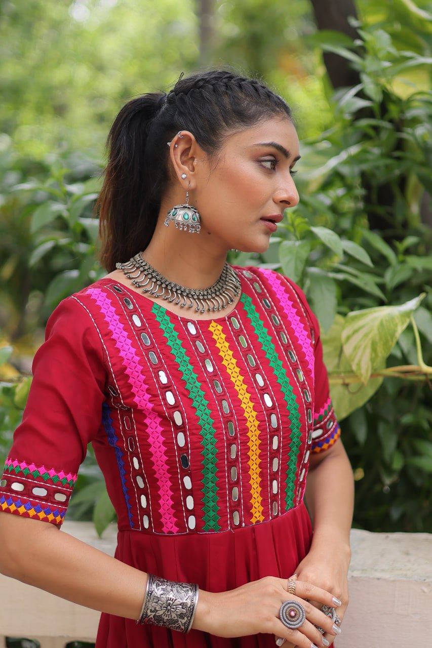 Maroon Designer Roman Fabric Gown with Multicolor Thread & Mirror Work ClothsVilla