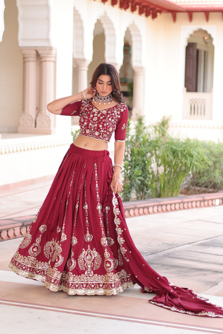 Maroon Elegant Vichitra Silk Full-Stitched Lehenga Choli Set with Heavy Sequins & Thread Embroidery, Unstitched Blouse & Designer Embroidered Dupatta ClothsVilla