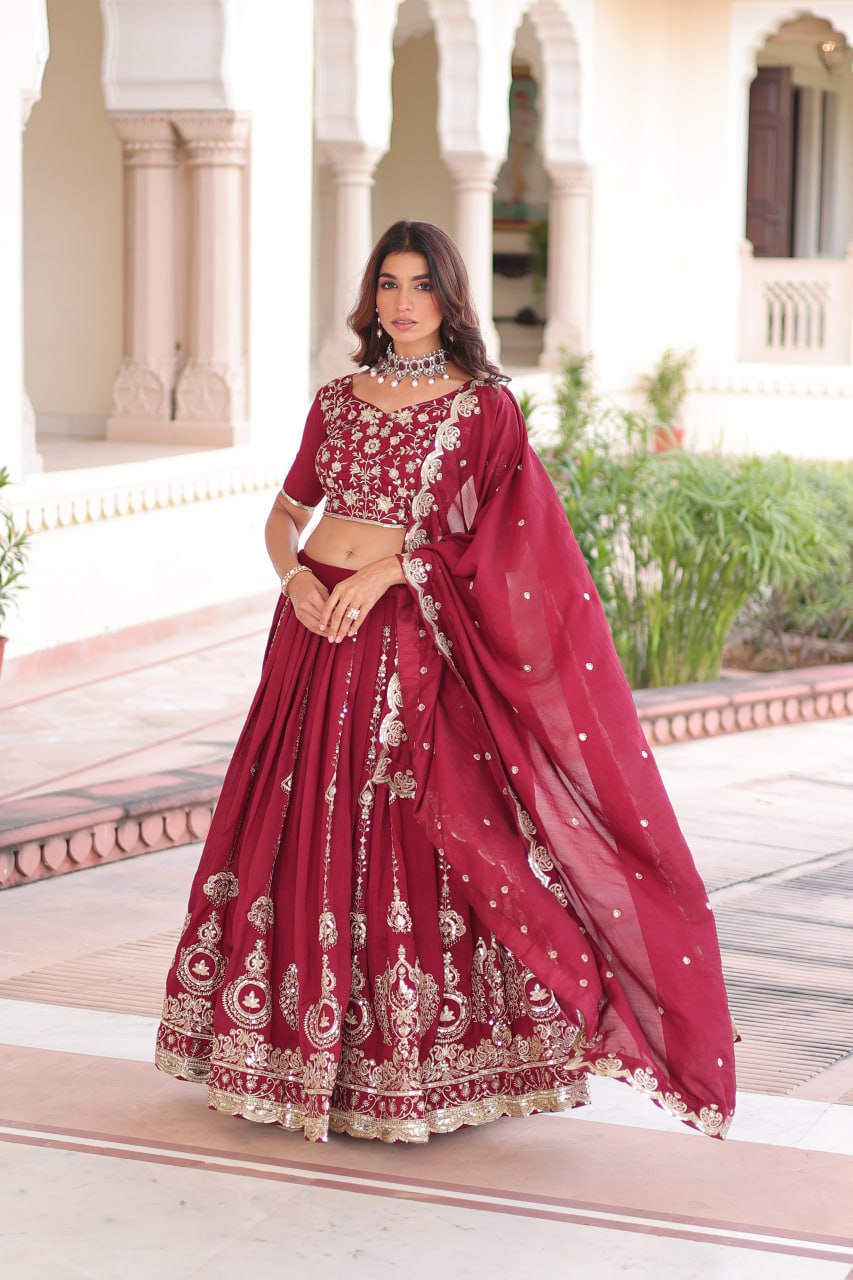 Maroon Elegant Vichitra Silk Full-Stitched Lehenga Choli Set with Heavy Sequins & Thread Embroidery, Unstitched Blouse & Designer Embroidered Dupatta ClothsVilla