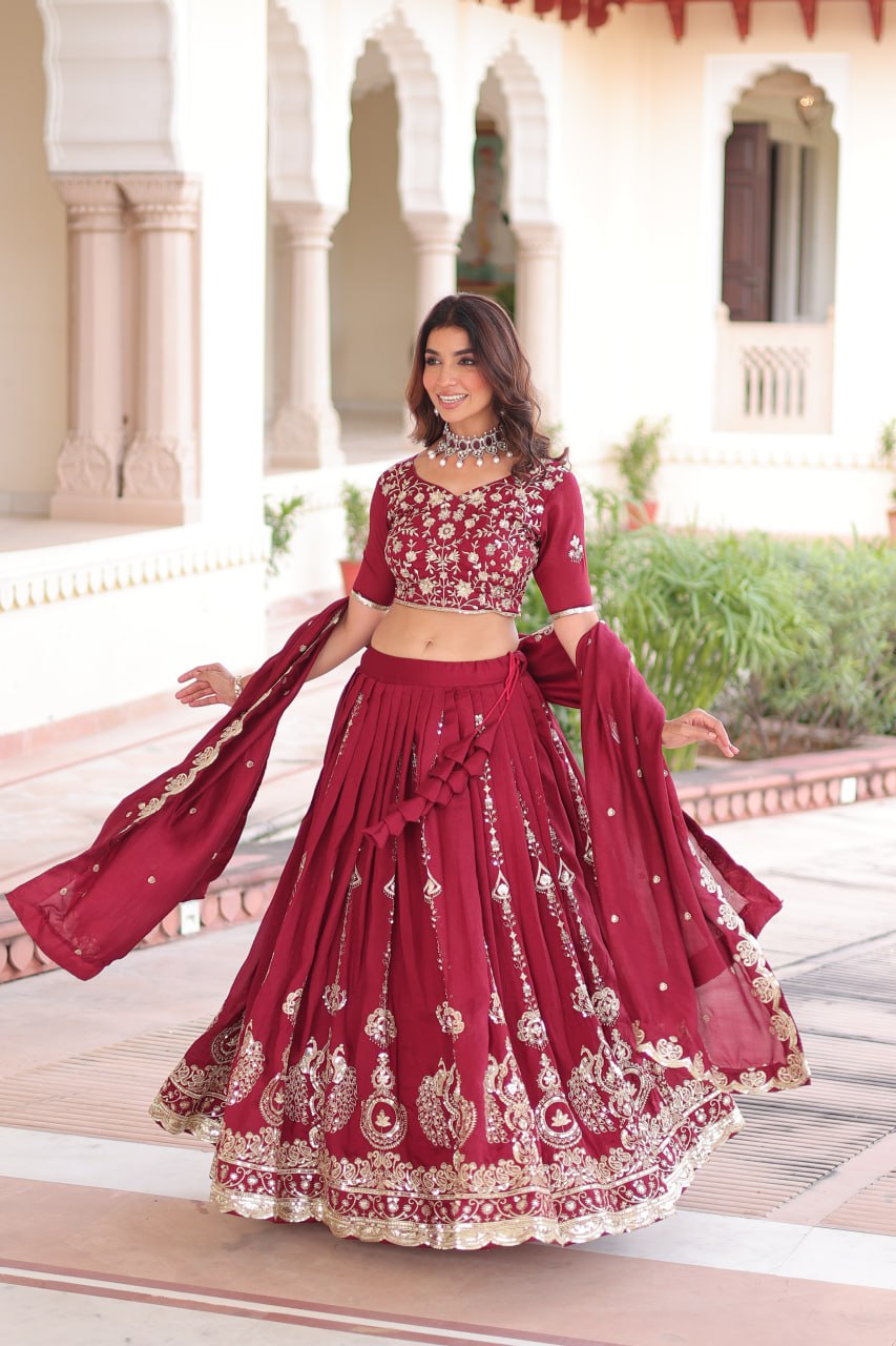 Maroon Elegant Vichitra Silk Full-Stitched Lehenga Choli Set with Heavy Sequins & Thread Embroidery, Unstitched Blouse & Designer Embroidered Dupatta ClothsVilla