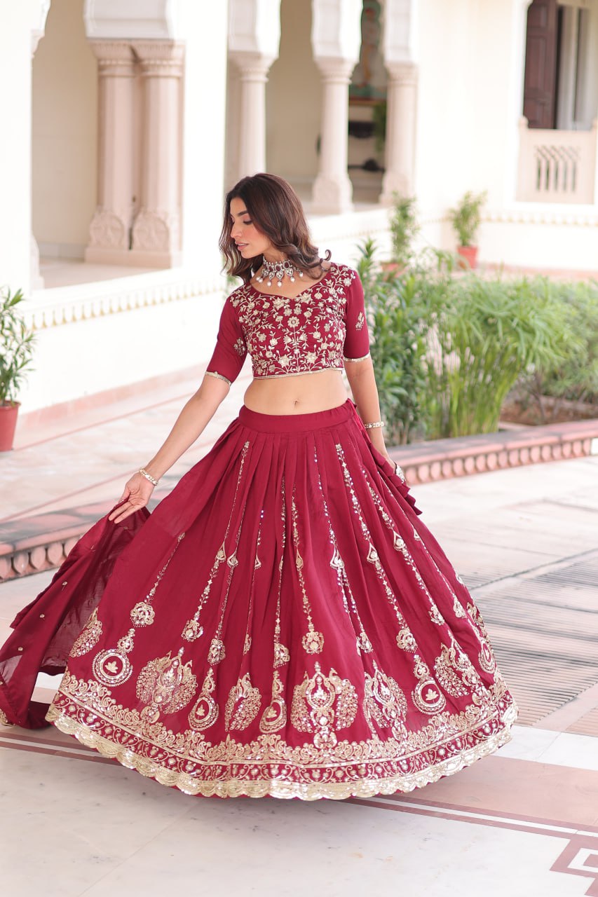 Maroon Elegant Vichitra Silk Full-Stitched Lehenga Choli Set with Heavy Sequins & Thread Embroidery, Unstitched Blouse & Designer Embroidered Dupatta ClothsVilla