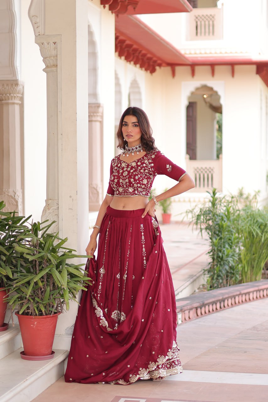 Maroon Elegant Vichitra Silk Full-Stitched Lehenga Choli Set with Heavy Sequins & Thread Embroidery, Unstitched Blouse & Designer Embroidered Dupatta ClothsVilla