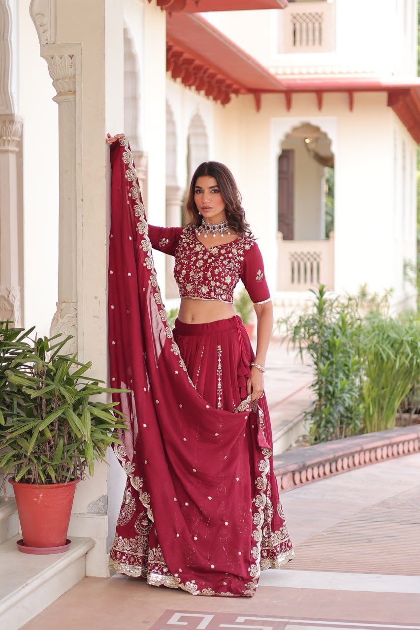 Maroon Elegant Vichitra Silk Full-Stitched Lehenga Choli Set with Heavy Sequins & Thread Embroidery, Unstitched Blouse & Designer Embroidered Dupatta ClothsVilla