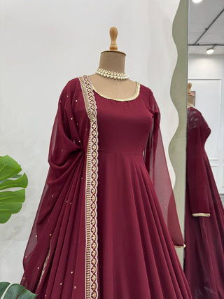 Maroon Glamorous Faux Georgette Gown with Sequined Lace Border & Dupatta ClothsVilla