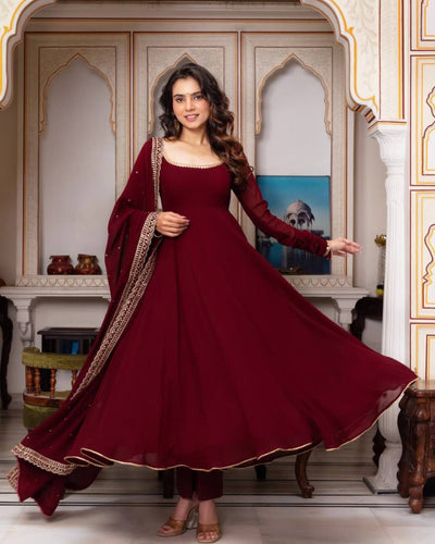 Maroon Glamorous Faux Georgette Gown with Sequined Lace Border & Dupatta ClothsVilla