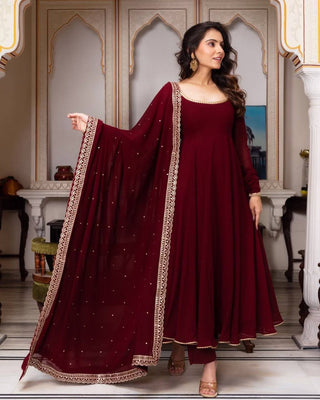 Maroon Glamorous Faux Georgette Gown with Sequined Lace Border & Dupatta ClothsVilla