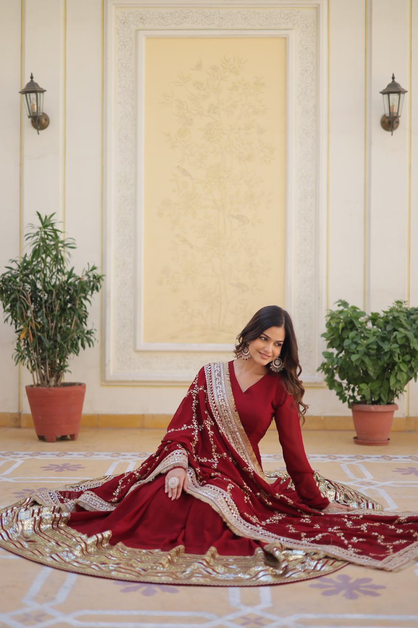 Maroon Luxurious Faux Blooming Embroidered Gown with Sequins & Designer Lace Dupatta ClothsVilla
