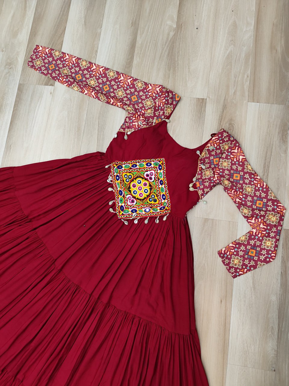 Maroon Navratri Special Gown with Kutchi Gamthi Embroidery – 3 Layer Frill & 12 Meter Flair ClothsVilla