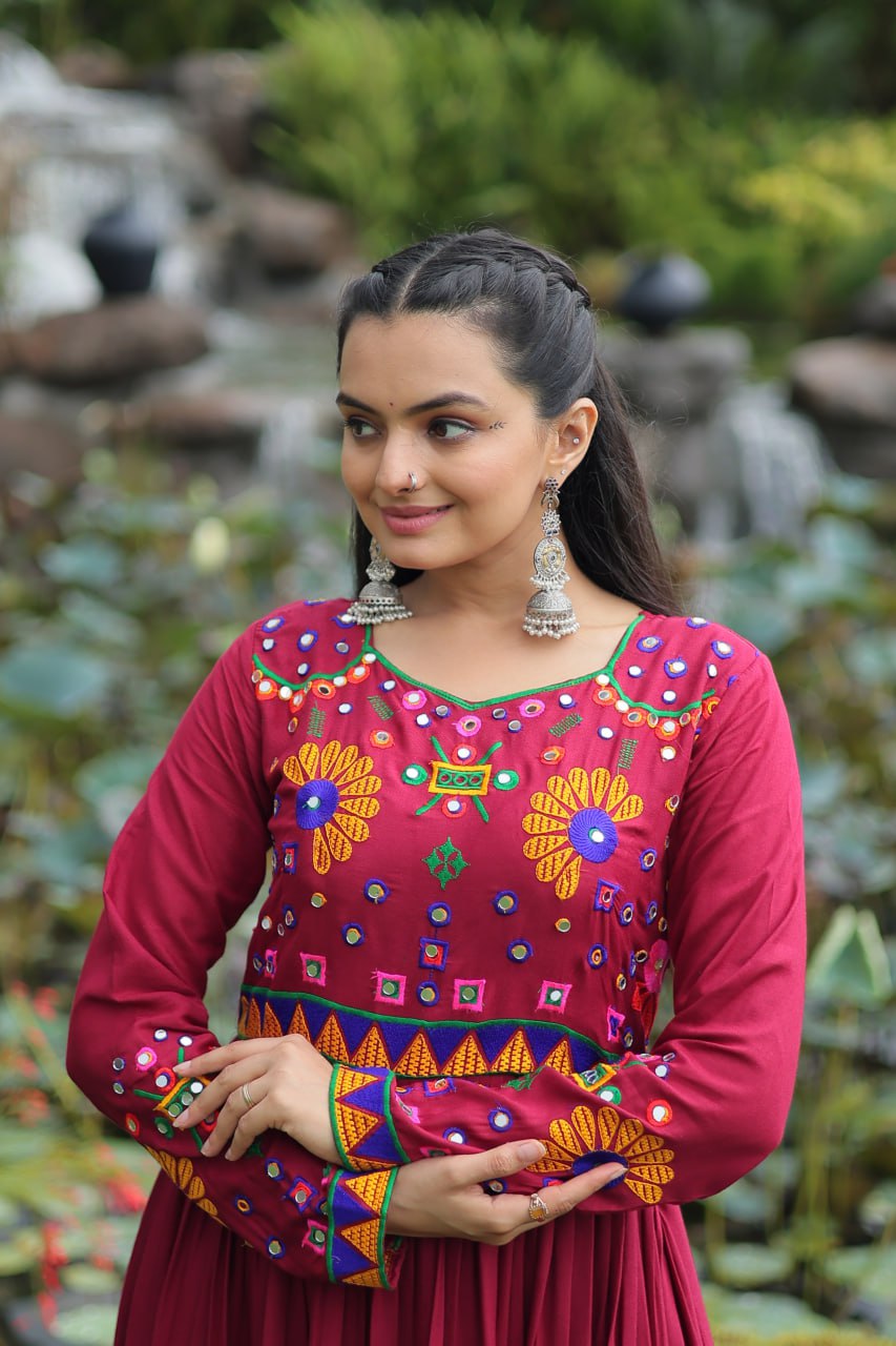 Maroon Navratri Special Kutchi Gamthi Work Gown in 14 Kg Rayon with 4-Layer Frill & Full Sleeves ClothsVilla