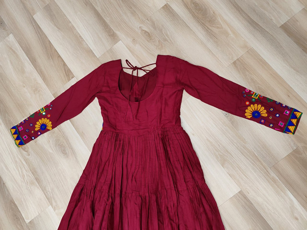 Maroon Navratri Special Kutchi Gamthi Work Gown in 14 Kg Rayon with 4-Layer Frill & Full Sleeves ClothsVilla