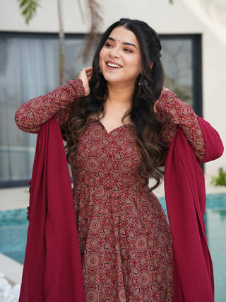 Maroon Pure Cotton Ajrakh Print Anarkali Suit Set with Crape Bottom & Faux Georgette Dupatta – Full-Flair 3-Piece Ethnic Set ClothsVilla