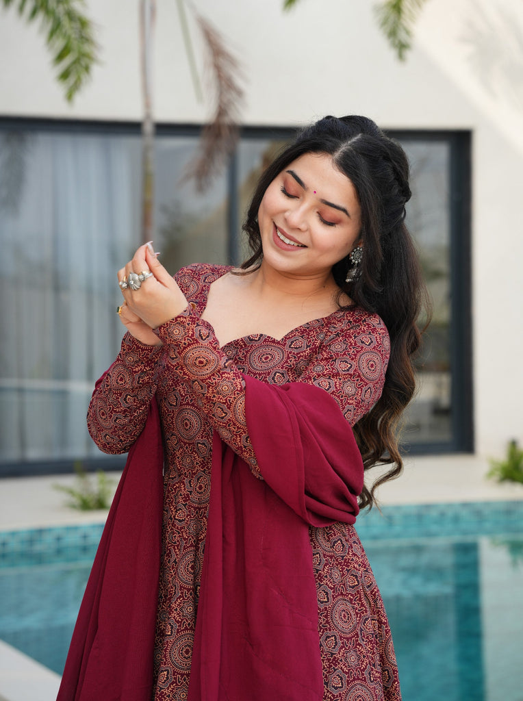 Maroon Pure Cotton Ajrakh Print Anarkali Suit Set with Crape Bottom & Faux Georgette Dupatta – Full-Flair 3-Piece Ethnic Set ClothsVilla