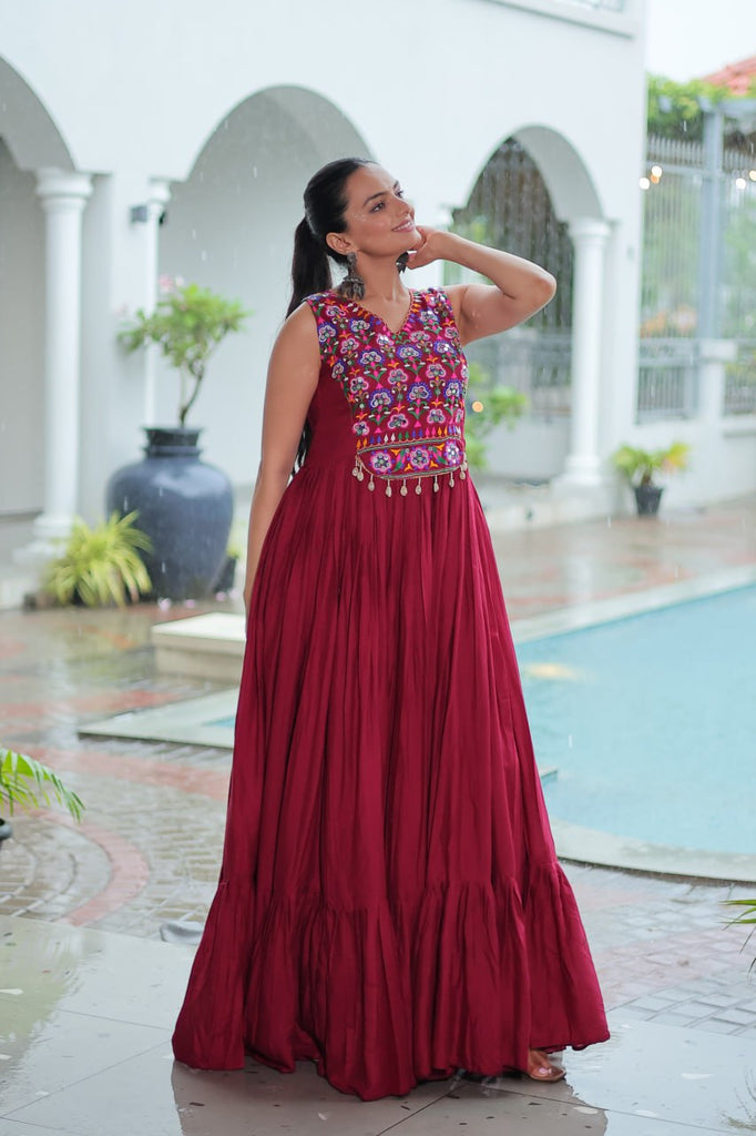 Maroon Rayon Navratri Gown with Kutchi Gamthi Embroidery & Mirror Work – Sleeveless with Flair ClothsVilla