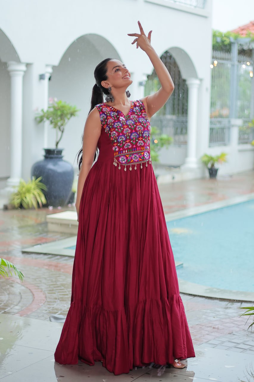 Maroon Rayon Navratri Gown with Kutchi Gamthi Embroidery & Mirror Work – Sleeveless with Flair ClothsVilla