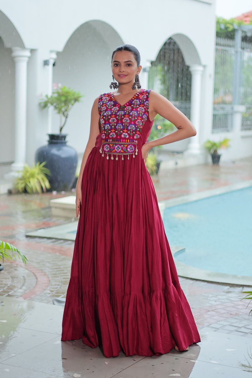 Maroon Rayon Navratri Gown with Kutchi Gamthi Embroidery & Mirror Work – Sleeveless with Flair ClothsVilla