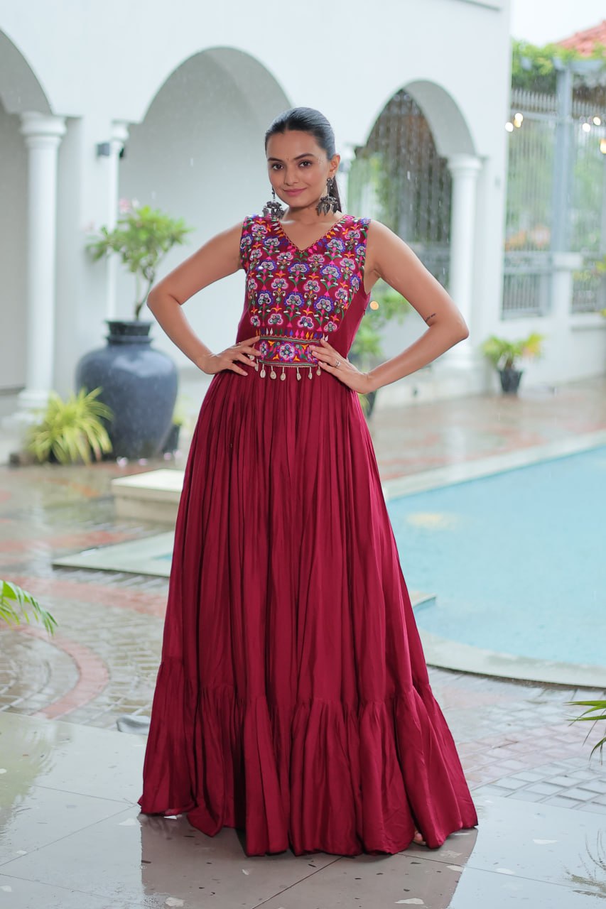 Maroon Rayon Navratri Gown with Kutchi Gamthi Embroidery & Mirror Work – Sleeveless with Flair ClothsVilla
