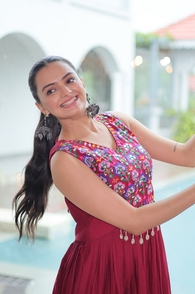 Maroon Rayon Navratri Gown with Kutchi Gamthi Embroidery & Mirror Work – Sleeveless with Flair ClothsVilla