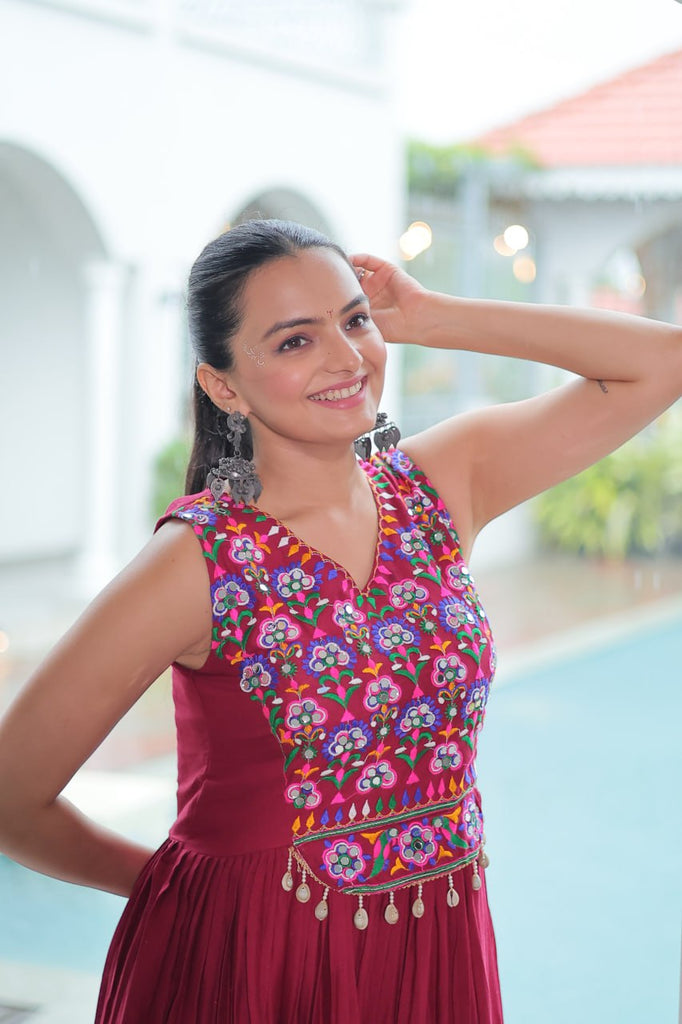 Maroon Rayon Navratri Gown with Kutchi Gamthi Embroidery & Mirror Work – Sleeveless with Flair ClothsVilla