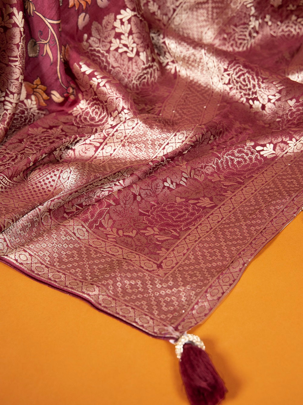 Maroon Viscose Kalamkari Saree with Zari Weaving & Tassels ClothsVilla