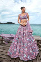 Load image into Gallery viewer, Mauve Net Sequins, Mirror and thread embroidery Semi-Stitched Lehenga choli &amp; Dupatta Clothsvilla
